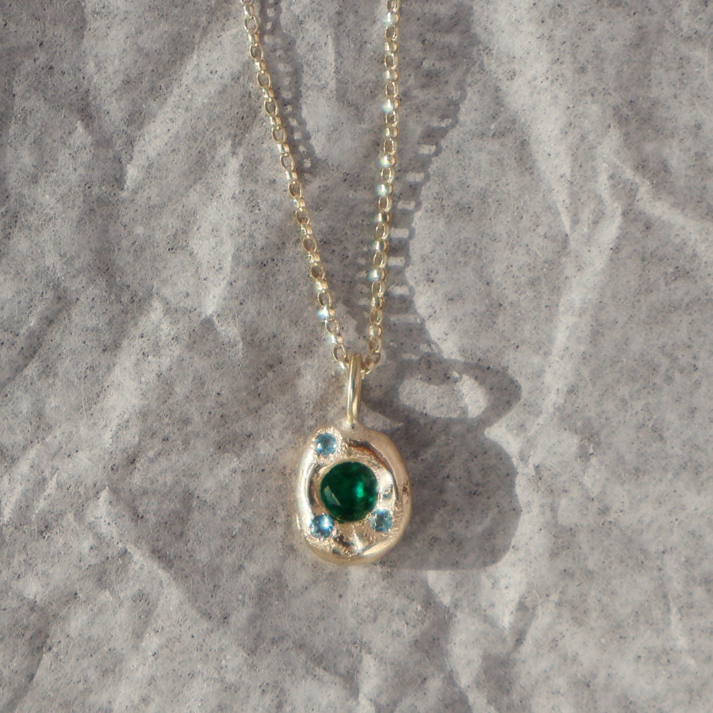 Molten Pendant - 9ct Gold - Round Emerald with Topaz