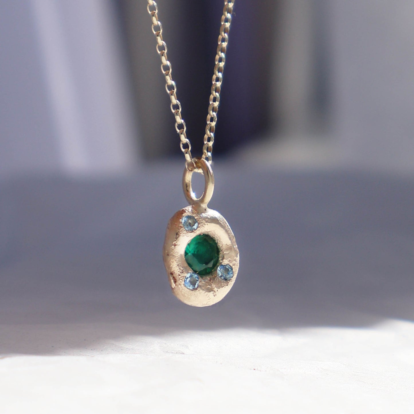 Molten Pendant - 9ct Gold - Round Emerald with Topaz