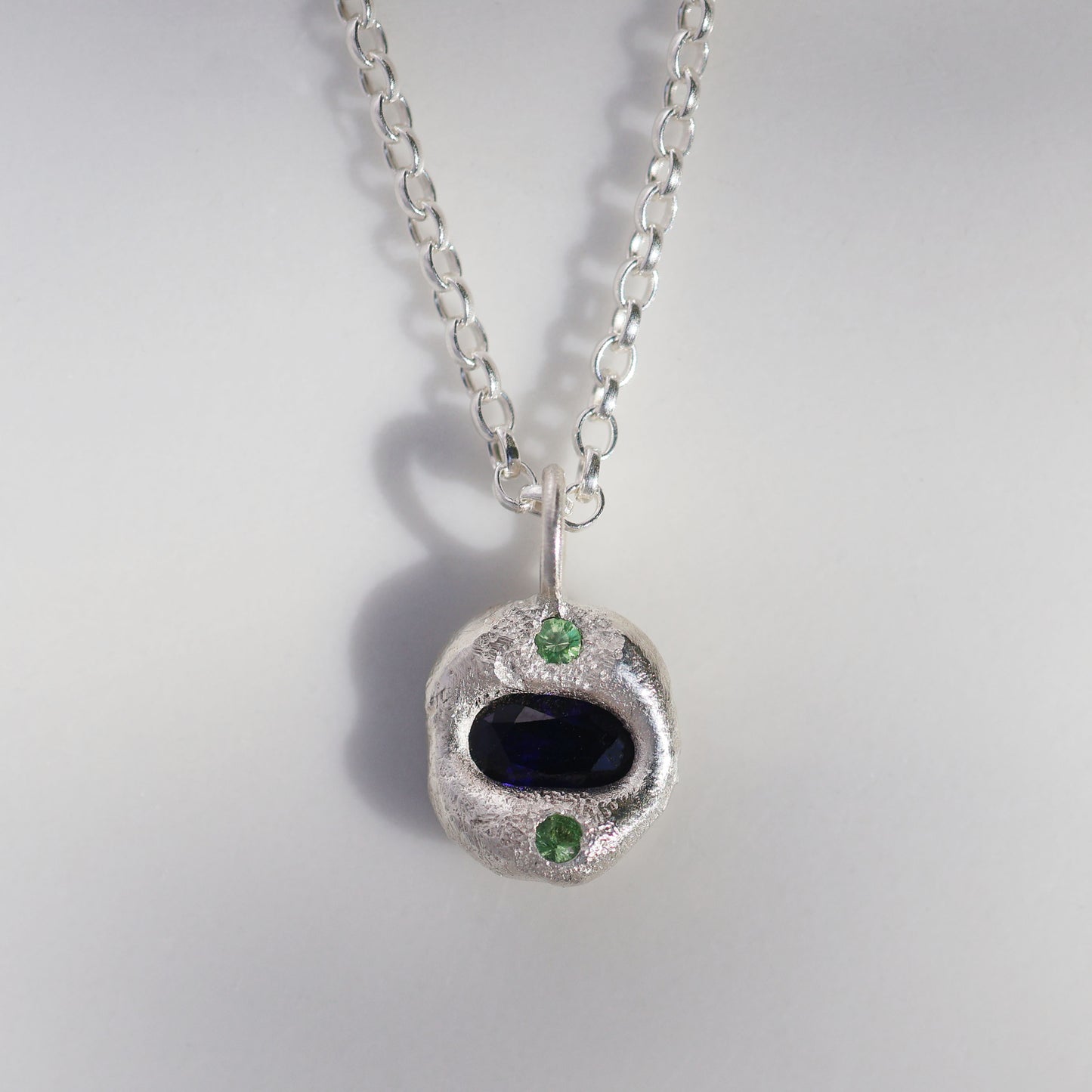 Molten Pendant  - Silver - Oval Blue Sapphire with Green Garnets