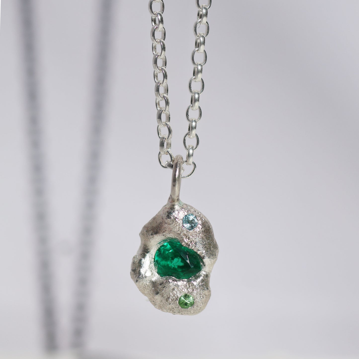 Molten Pendant  - Silver - Pear Emerald with Blue Topaz and Tsavorite Garnet